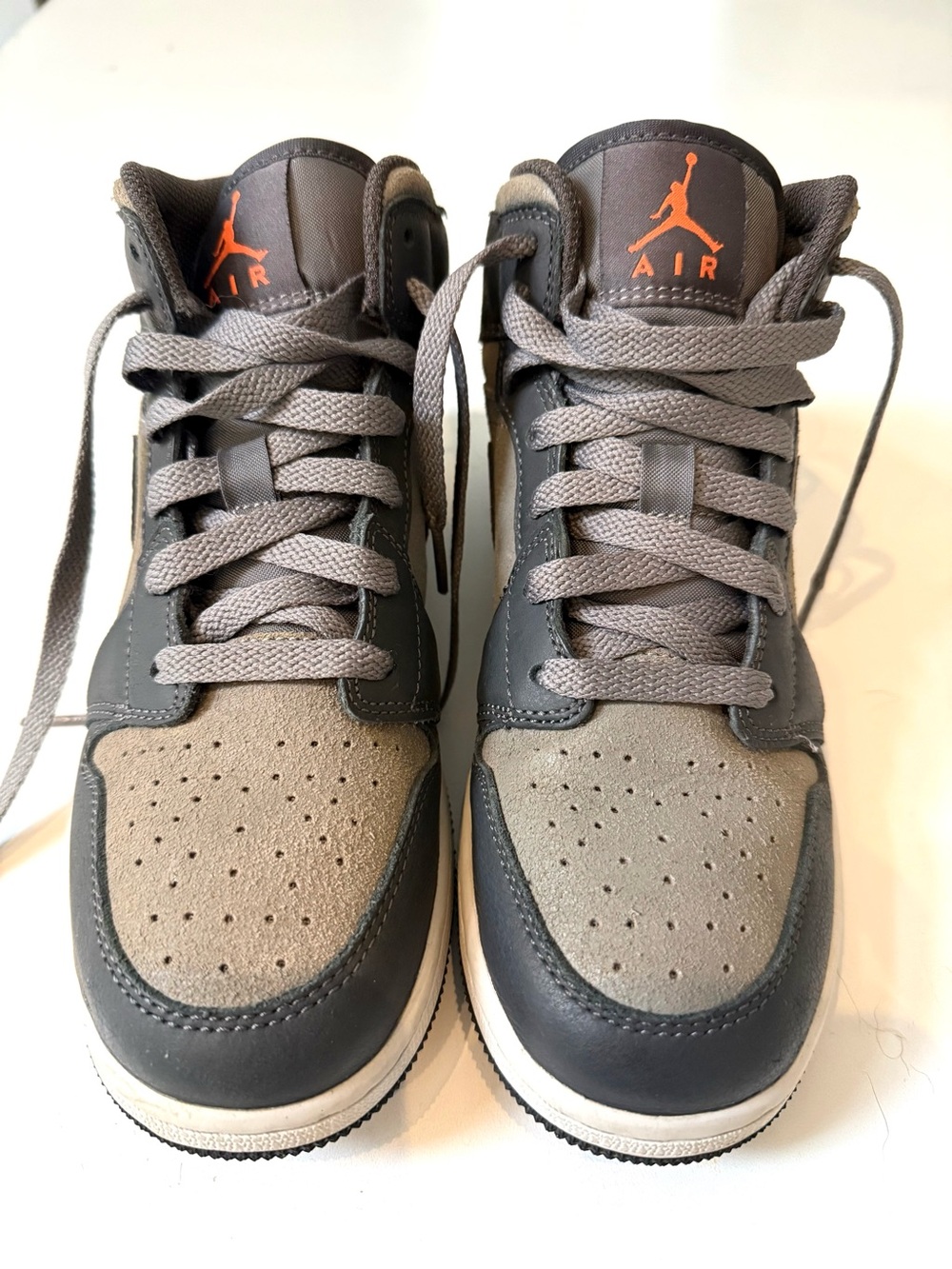 Nike AirJordons in Gray with Orange Jumpman (NOTE: not discolored IRL)